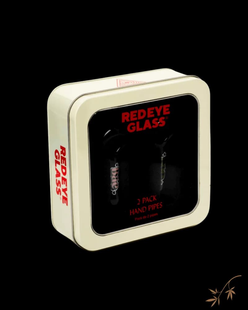 Red Eye Glass 2-pack hand pipes in cream-colored retail box with black window display and red branding