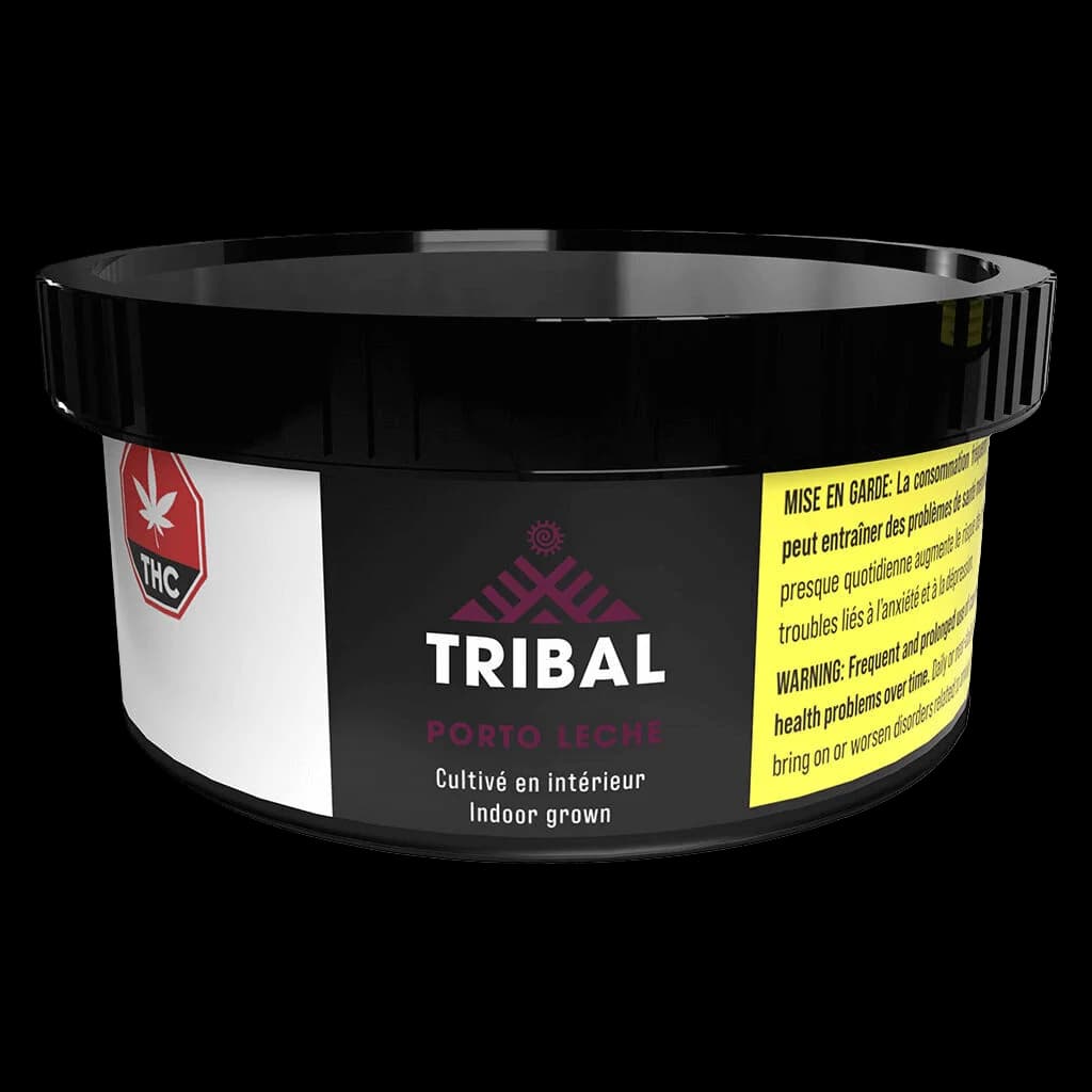 Tribal Porto Leche cannabis dried flower in black cylindrical jar with purple logo and yellow health warning label