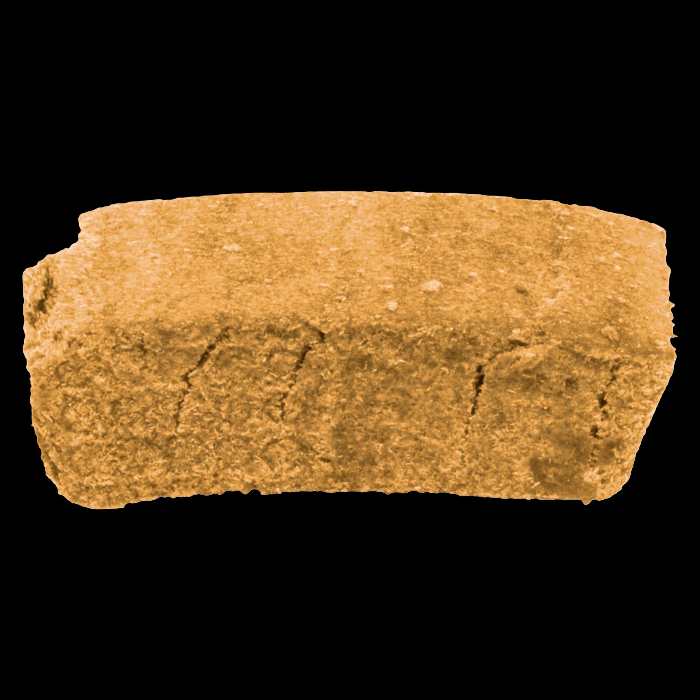 7ASHISH Lebanese Blonde cannabis hash, light tan compressed brick with textured surface