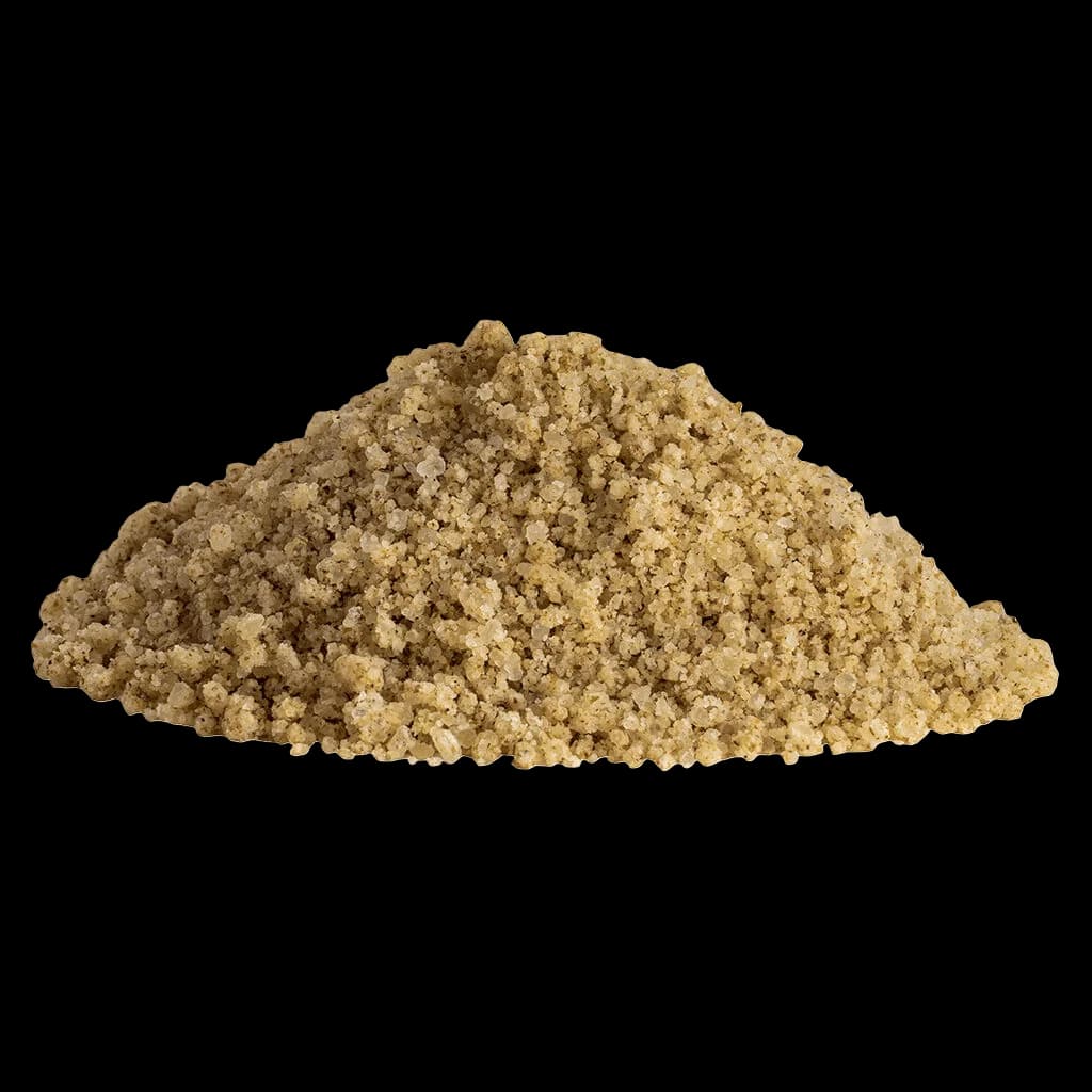 Rebound by Stewart Farms SeaWeed OG CBD Salt Soak, granular bath salt product with golden-tan crystalline texture