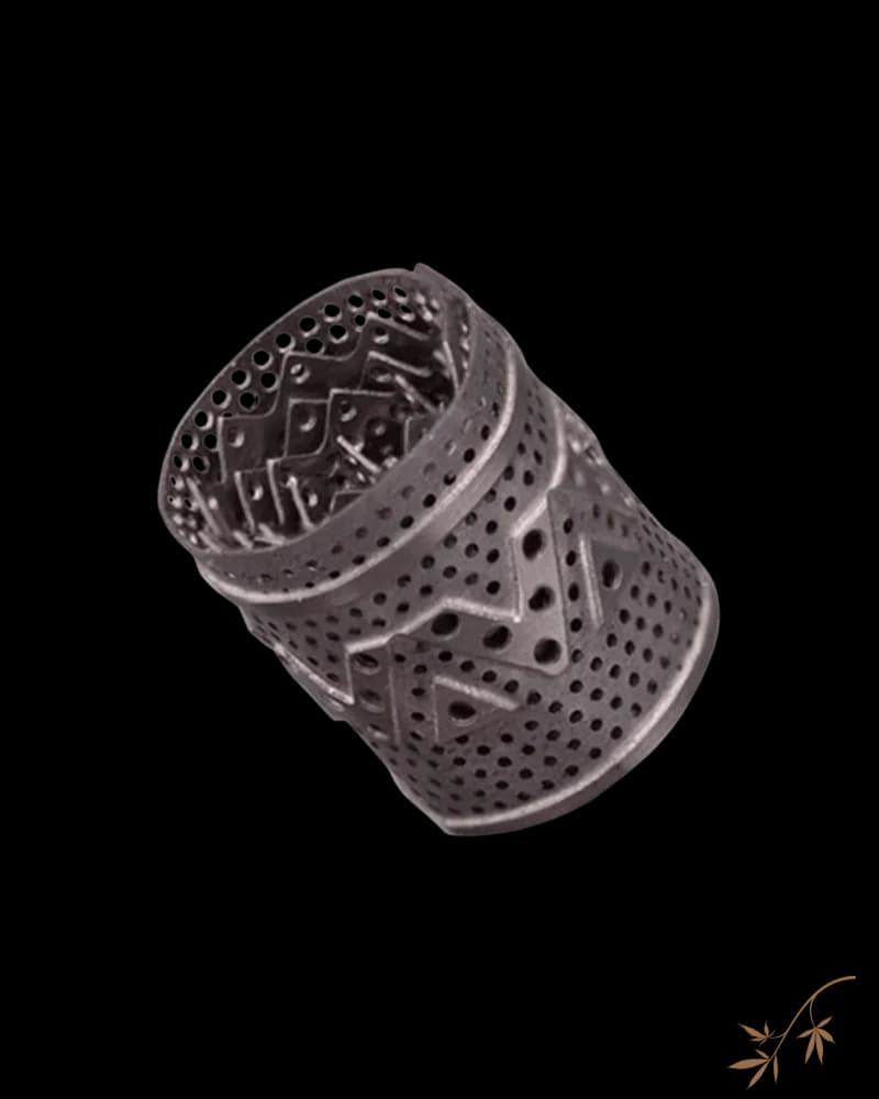 Dynavap Dynacoil replacement heating chamber, black perforated metal cylinder with internal ribbed design