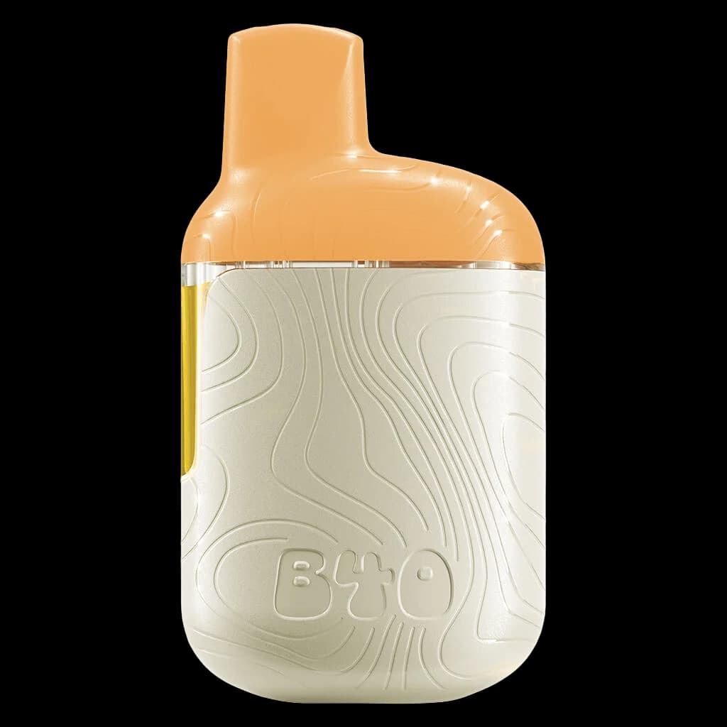 Back Forty Peach Lemonade cannabis vape cartridge with peach-colored mouthpiece and cream textured body