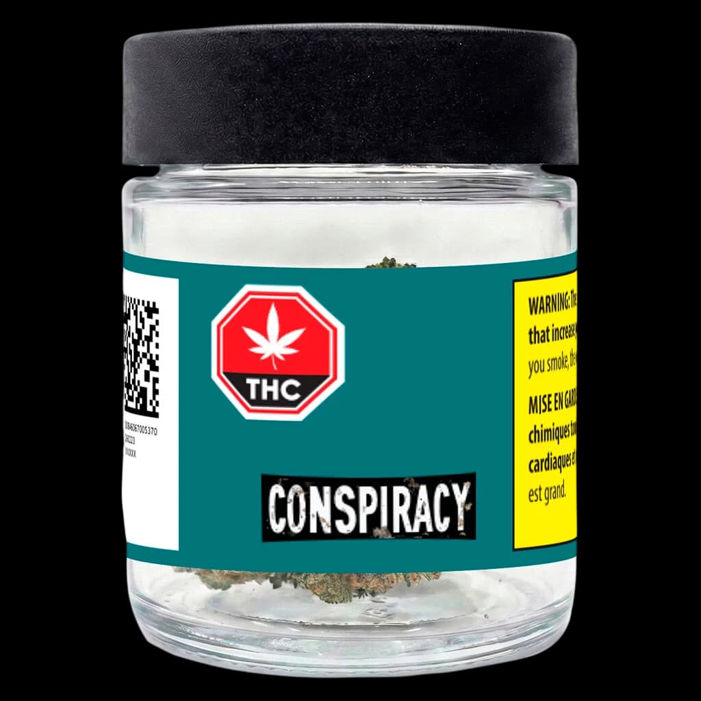 Conspiracy Reptilian Reserve dried flower cannabis in glass jar with black cap, teal and yellow label