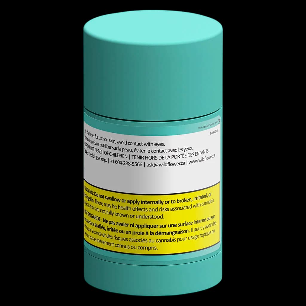 Wildflower Extra Strength 1:1 Relief Stick in turquoise cylindrical packaging with Health Canada warning labels