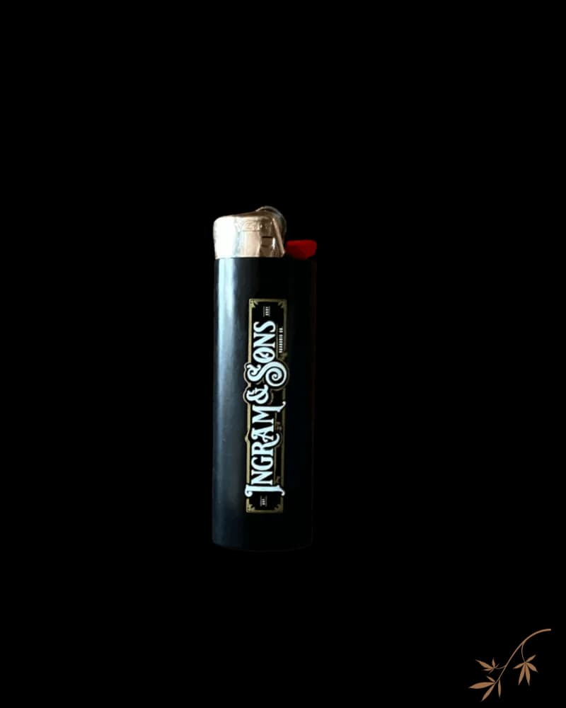 Ingram & Sons BIC lighter with black body, silver top, and red ignition button